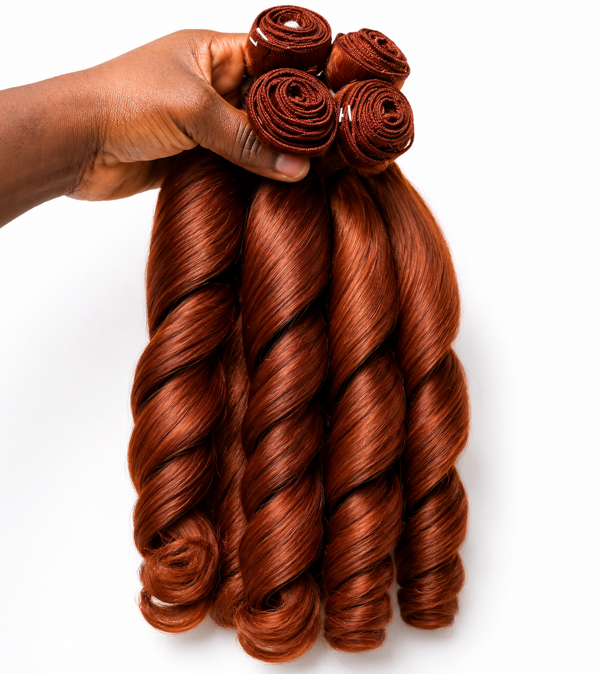 Copper spiral curl ponytail style by Stella Hair Shine